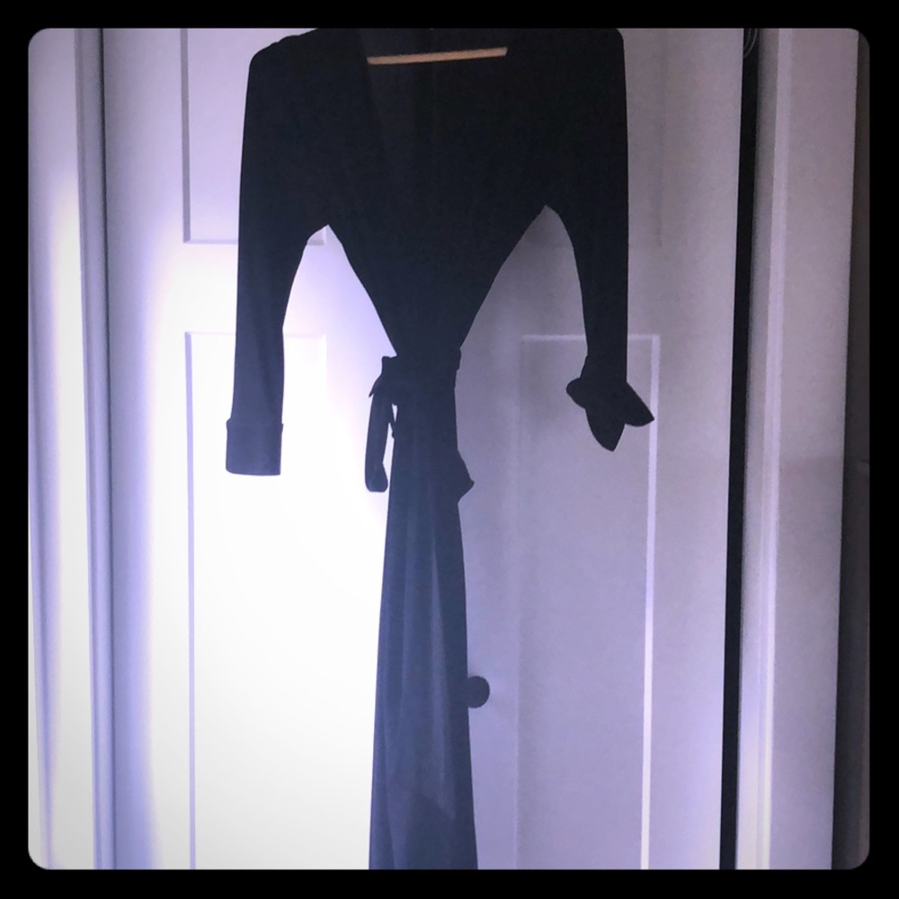 Iconic DVF black wrap dress.